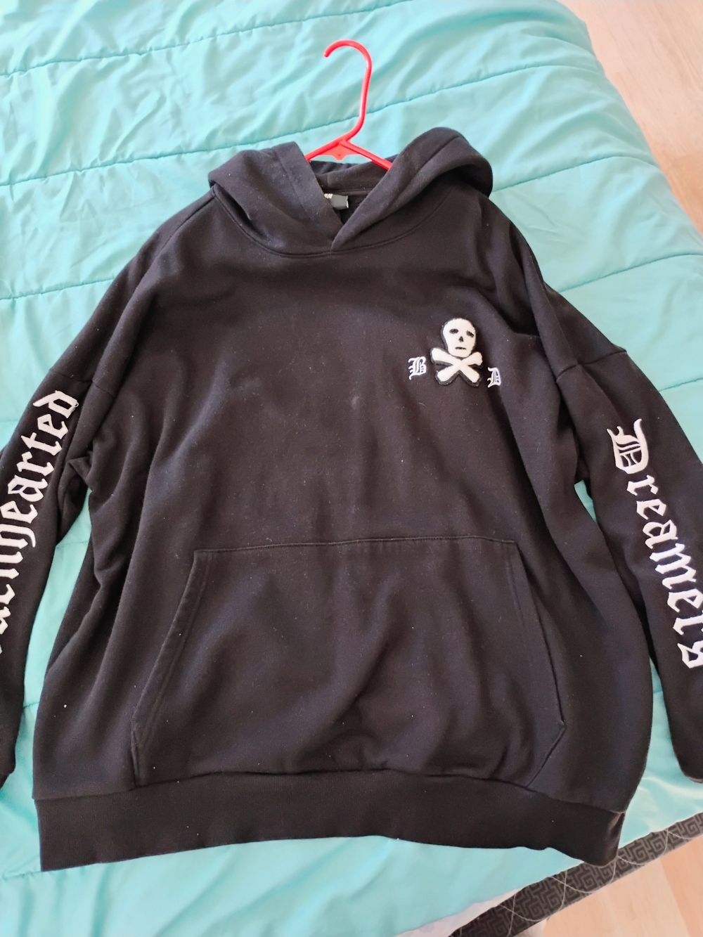 Black Hooded Sweater with Skull & Crossbones Graphic